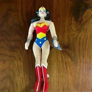 Wonder woman plastic figure plush doll.